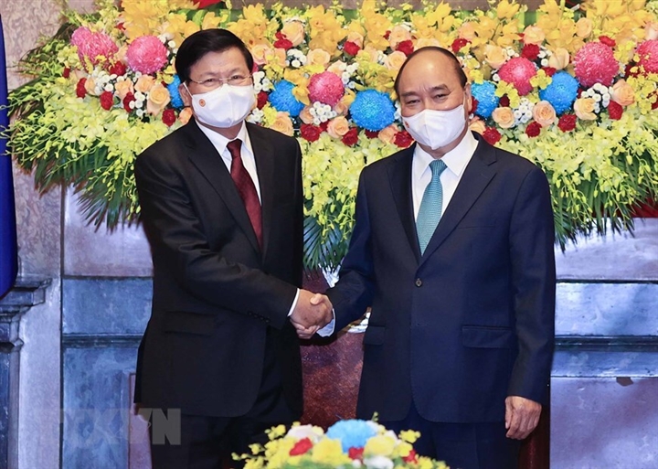 Chủ tịch nước Nguyễn Xuân Phúc hội kiến Tổng Bí thư, Chủ tịch nước Lào